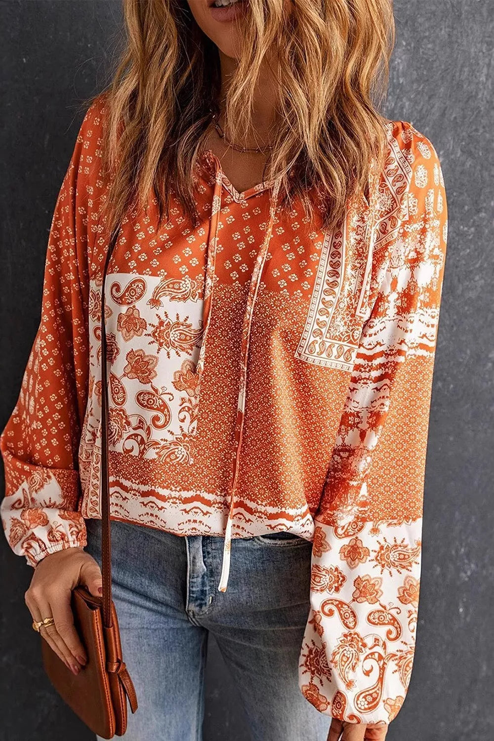 burnt orange blouse with paisley and v-neck