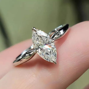 Diamond ring with marquise cut stone in silver setting