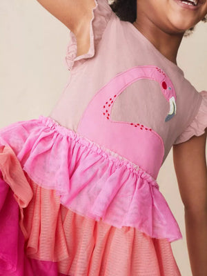 Pink cotton dress with flamingo appliqué and tiered ruffle tulle skirt.