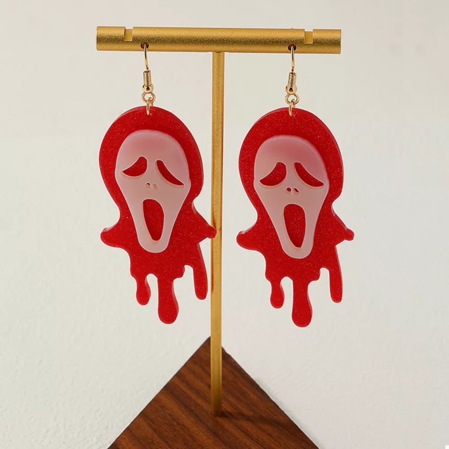 red earrings with graphic and N/A
