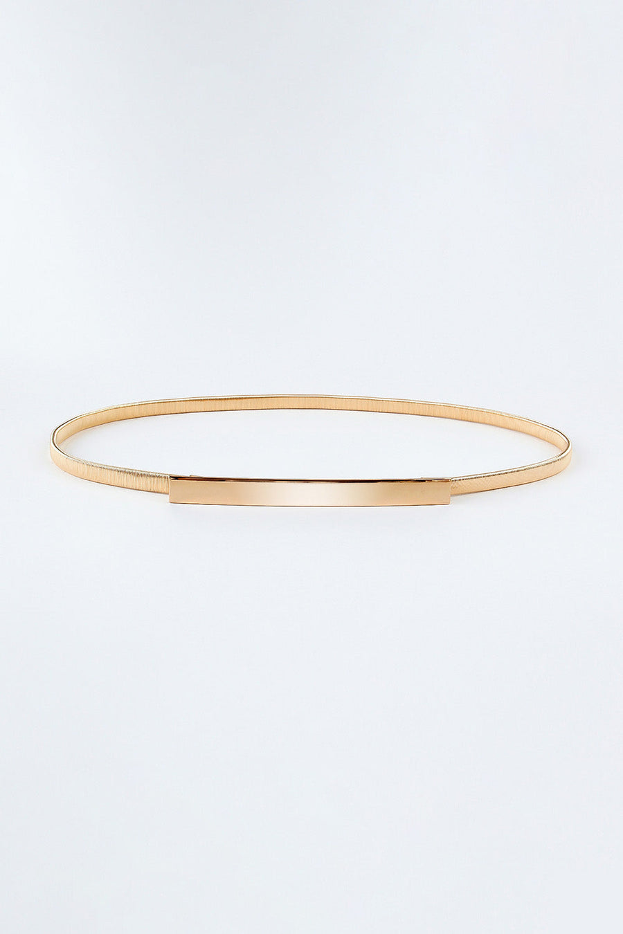 Slimline gold-tone metal waist belt with a polished rectangular buckle.