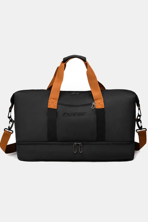 Black duffel bag with orange straps and a separate zippered bottom compartment.