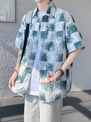 Men's short sleeve button-down shirt in abstract green and white pattern, cotton.