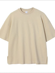 Beige waffle knit boxy t-shirt with crew neck and short sleeves.