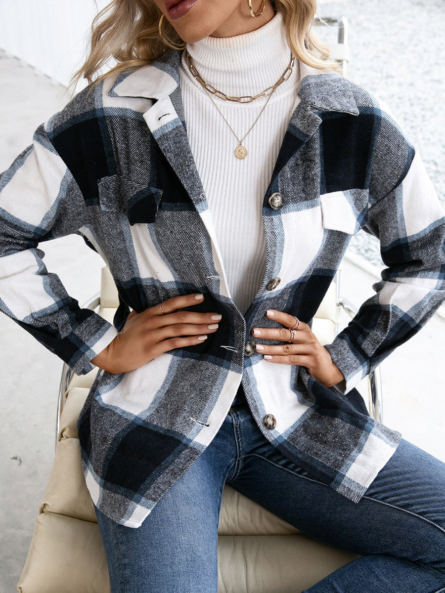 Belted black plaid overshirt with patch pockets and button-down front.