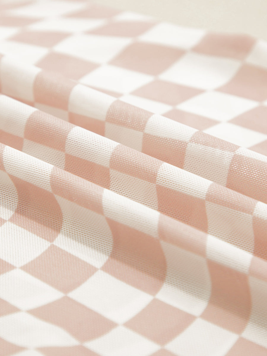 Checkered mesh crew neck t-shirt in beige and white with a subtle texture.