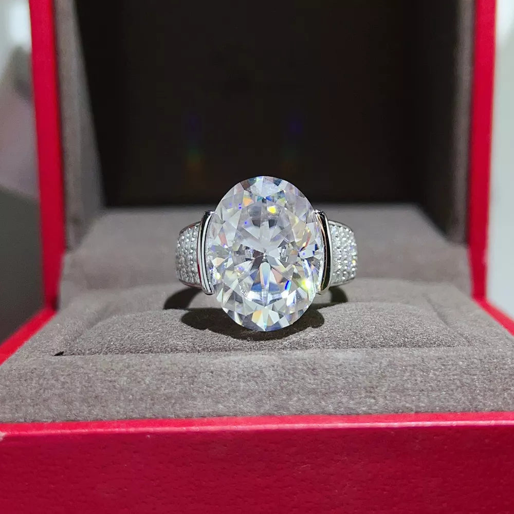 ring in silver featuring oval cut stone and solitaire ring fit