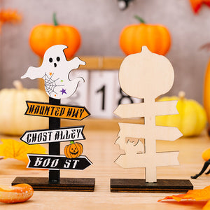 Halloween directional signposts with ghost and pumpkin, one unfinished wood.