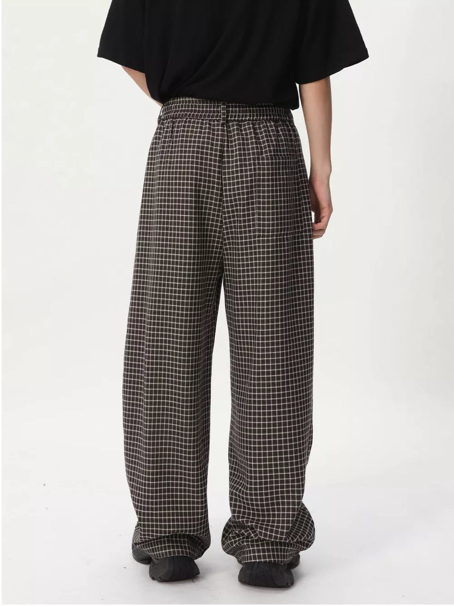 Plaid wide-leg relaxed fit joggers in grey with an adjustable waistband.