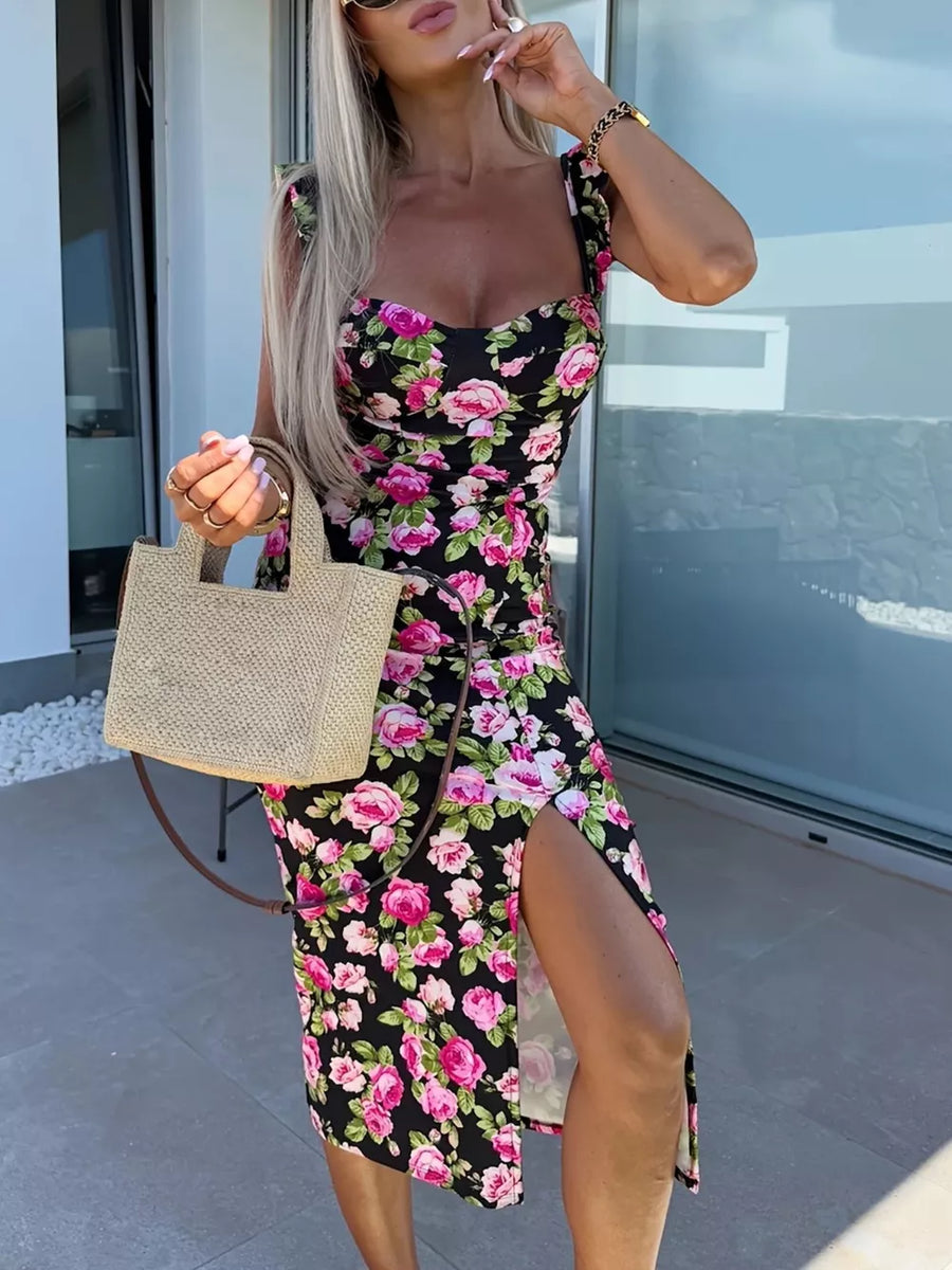 Floral sweetheart midi dress with a high slit, black with pink floral print.