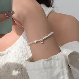 Synthetic Pearl,925 sterling silver,Artificial crystal Care instructions: Avoid bracelet in silver with regular silhouette
