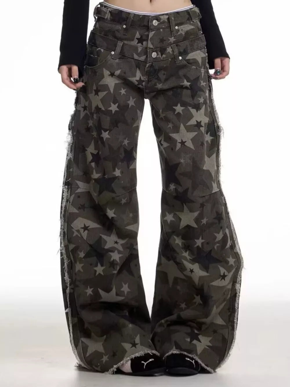 Star-embellished distressed wide-leg jeans in dark grey cotton with raw hems.