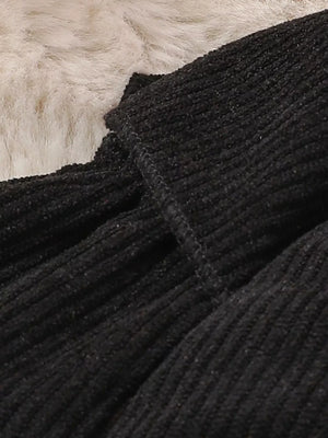 Black bodysuit with full-length and snap, button