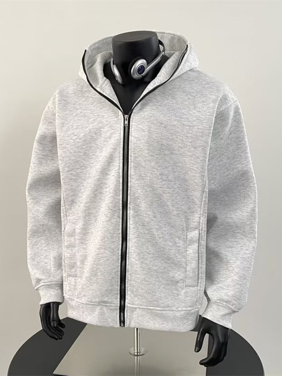 Light grey zip-up hoodie with pockets and long sleeves