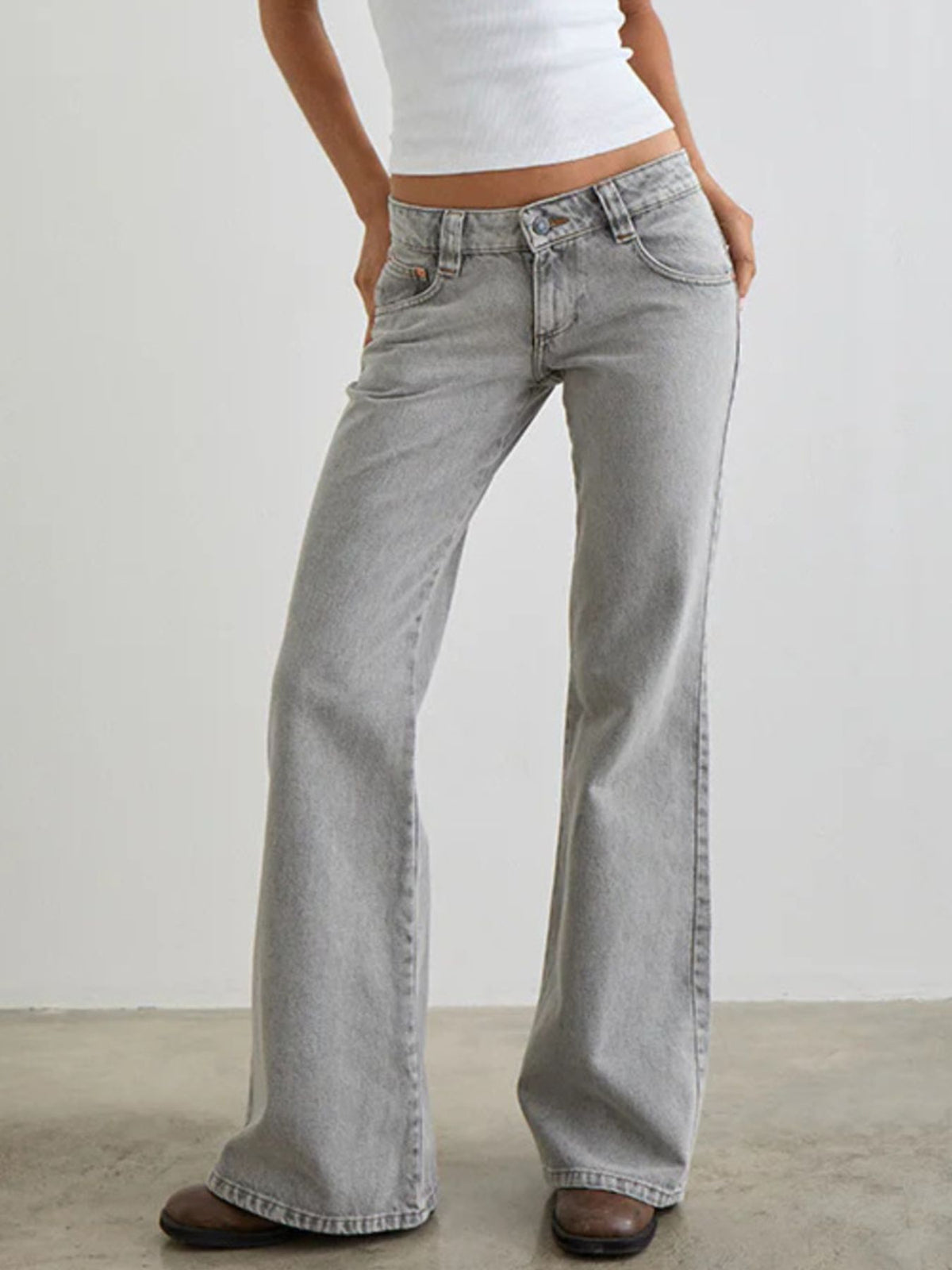 Light gray cotton low rise flare leg jeans with pockets
