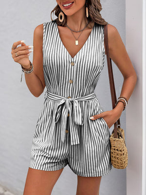 Striped button-front romper with V-neck, sleeveless design, and tie waist in gray and white.
