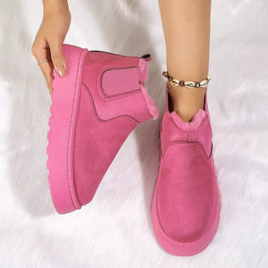 Hot Pink suede round toe platform ankle boots with faux fur lining.
