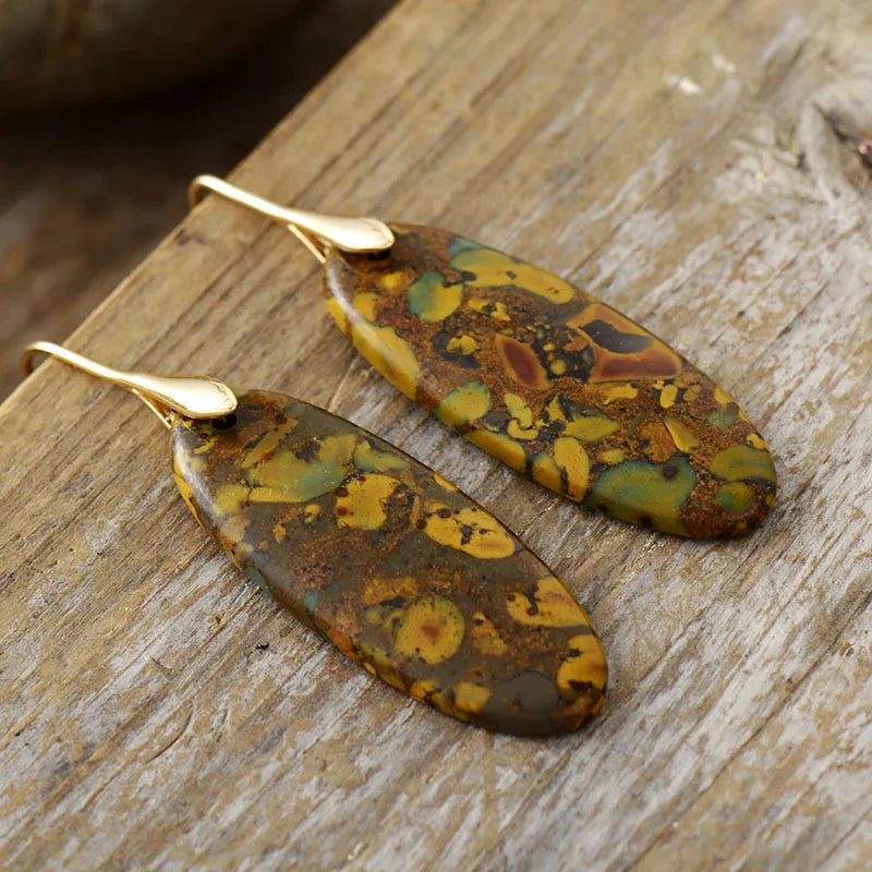 Verdant Stone Elongated Drop Earrings with gold hooks and abstract patterns.