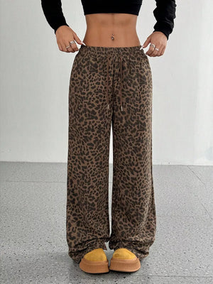 95% polyester, 5% elastane Care instructions: Machine wash cold wide-leg pants in Brown with flared silhouette