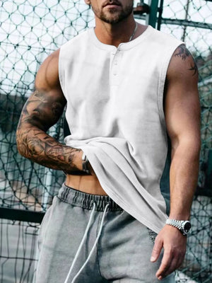 White henley neck sleeveless muscle tank top with button detail.