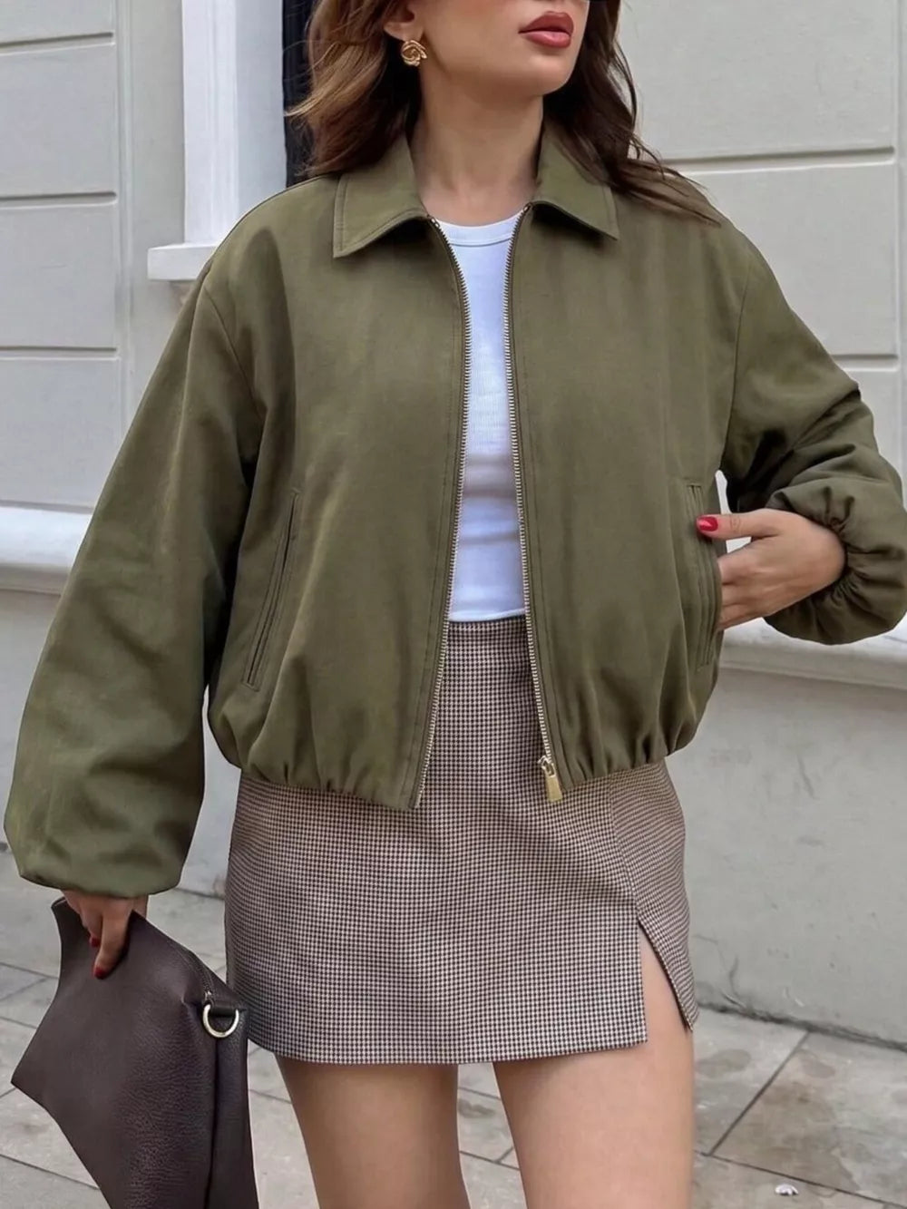 100% polyester Care instructions: Machine wash cold bomber jacket in ivory with oversized silhouette