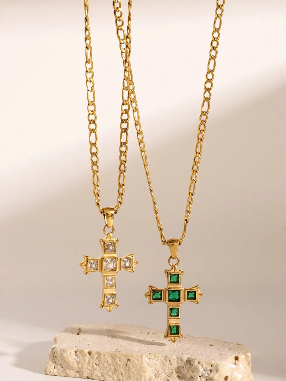 Emerald and white zirconia cross pendant necklaces on gold chains