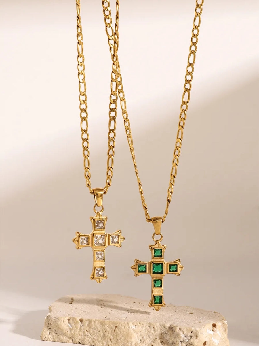 Emerald and white zirconia cross pendant necklaces on gold chains