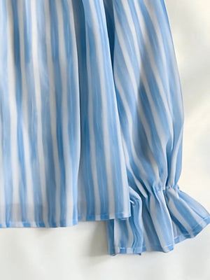 100% polyester Care instructions: Machine wash cold blouse in Blue with relaxed silhouette