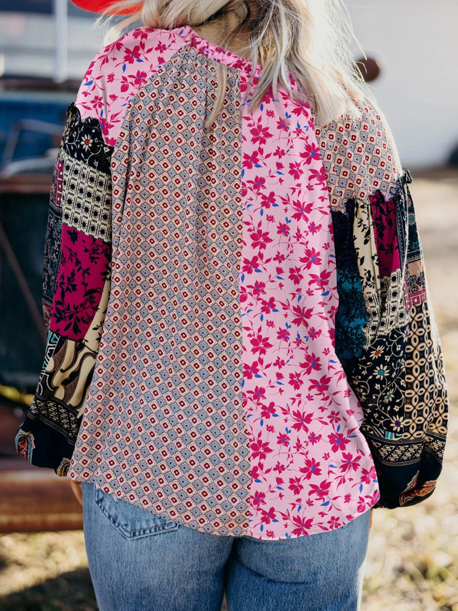 Boho floral patchwork blouse in fuchsia pink with drop shoulders and bubble sleeves.