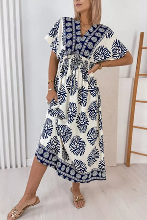 Blue floral print V-neck dolman dress with drawstring waist and ankle length