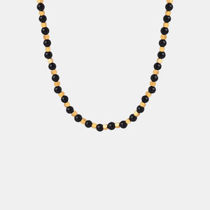 Black onyx and gold bead necklace with 18K gold accents.