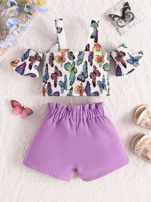 Baby girl butterfly print smocked crop top with cold shoulder sleeves and purple ruffled shorts.