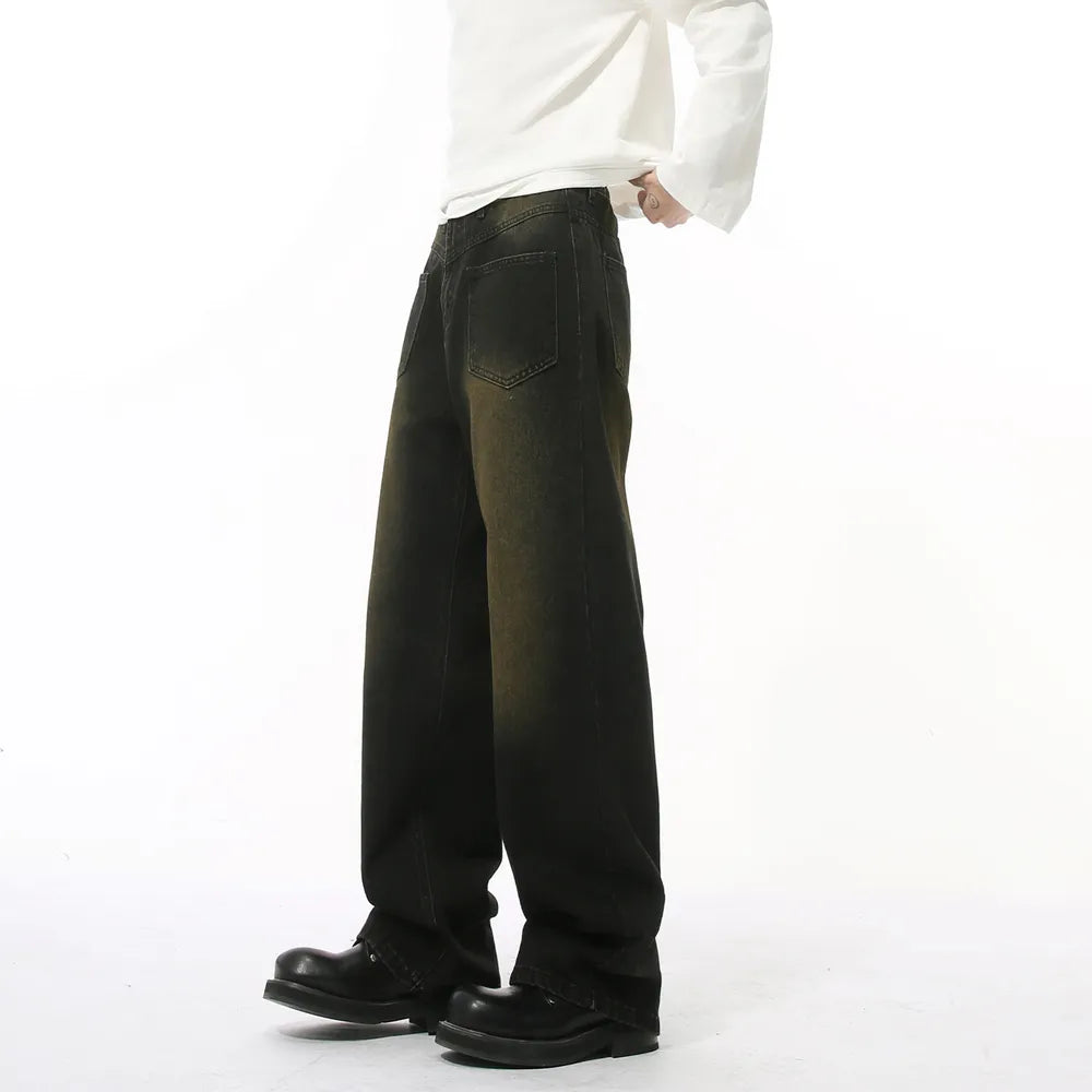 Dark wash wide-leg distressed denim jeans with a relaxed fit.