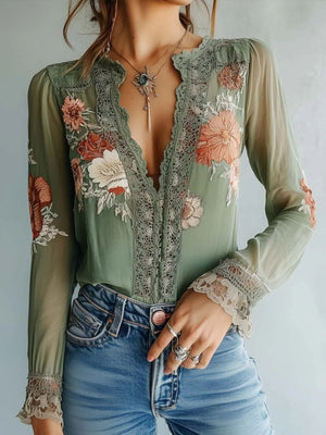 Green floral embroidered lace blouse with bishop sleeves and deep V-neck