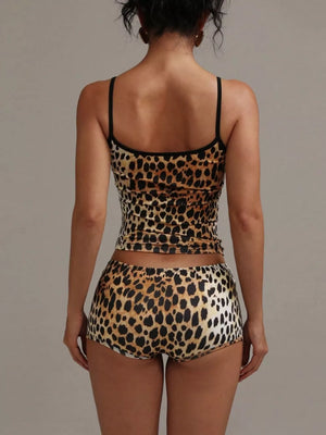 Women's leopard print cami and shorts pajama set with adjustable straps.
