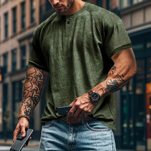 Textured Army Green Henley Tee with raglan sleeves and button placket.