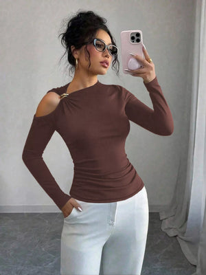 Brown long sleeve t-shirt with cutout shoulder detail and gold ring accent.