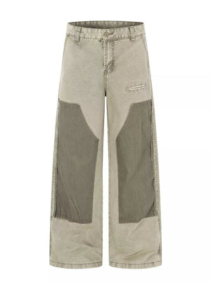 Two-tone wide-leg cargo pants in khaki and green with distressed details and patchwork.