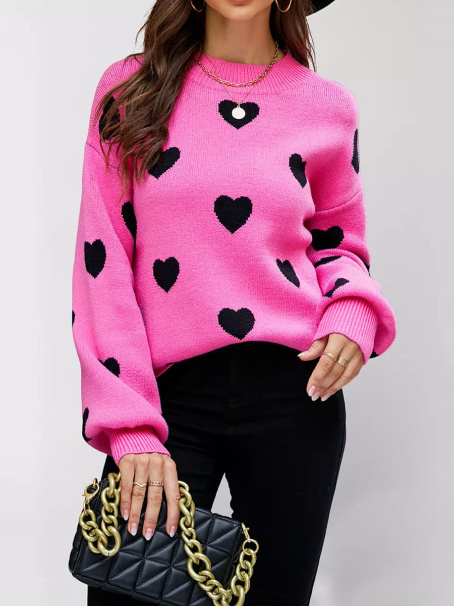 hot pink pullover sweater with heart-print and crew neck