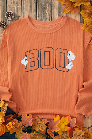 Orange corduroy sweatshirt with "BOO" appliqué and ghost details