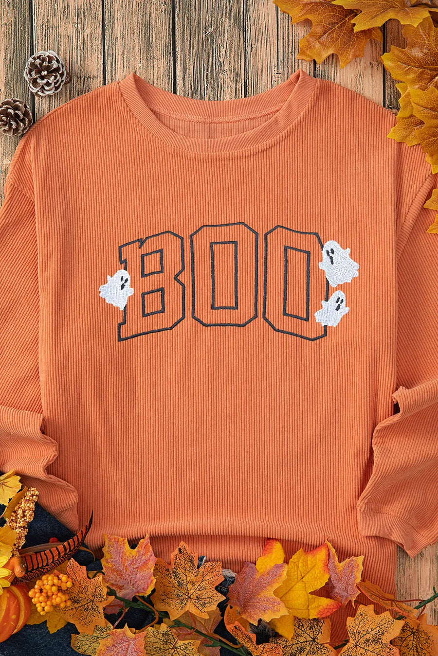 Orange corduroy sweatshirt with "BOO" appliqué and ghost details