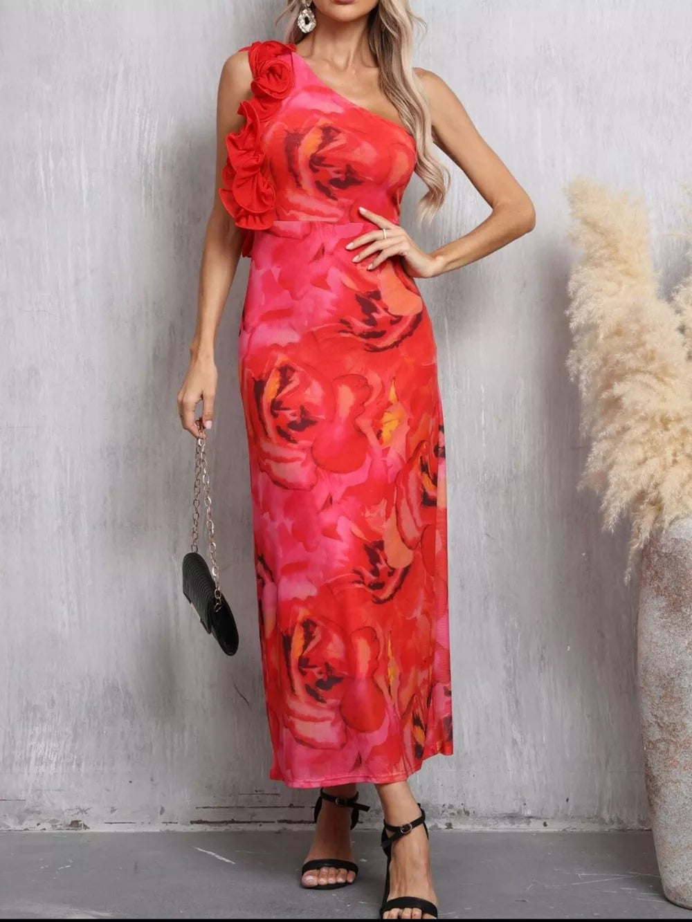 Floral one shoulder maxi dress in red and pink with rose print and ruffled detail.