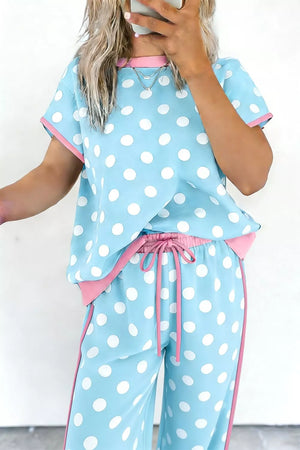 Blue polka dot polyester loungewear set with pink contrast trim and drawstring waist.