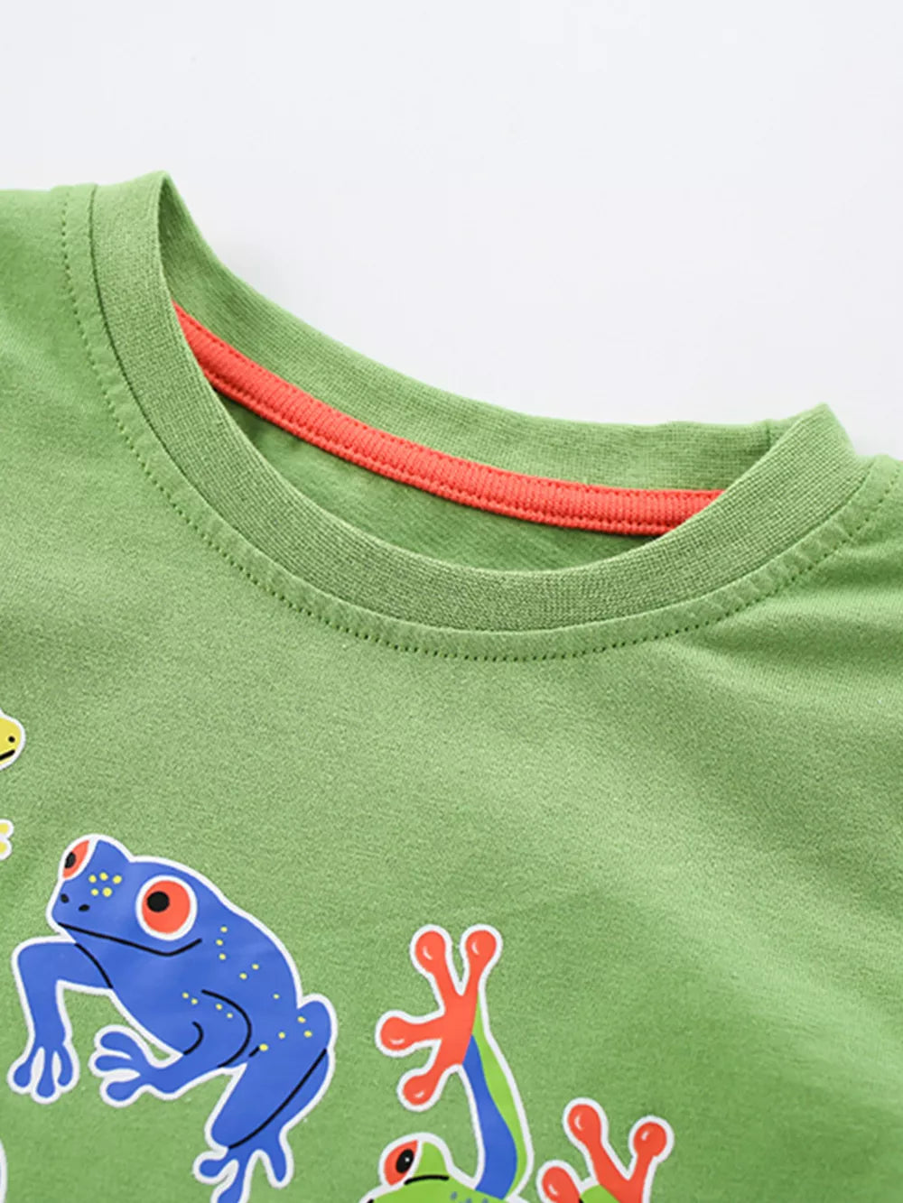 Green cotton crew neck t-shirt with a fun frog graphic and red neck trim.