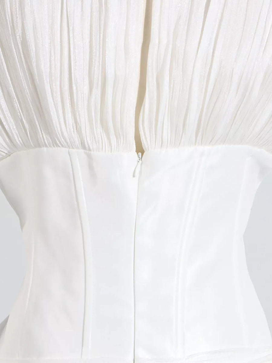 White ruffled mini dress with balloon sleeves, featuring a zipper closure and corset bodice detail.