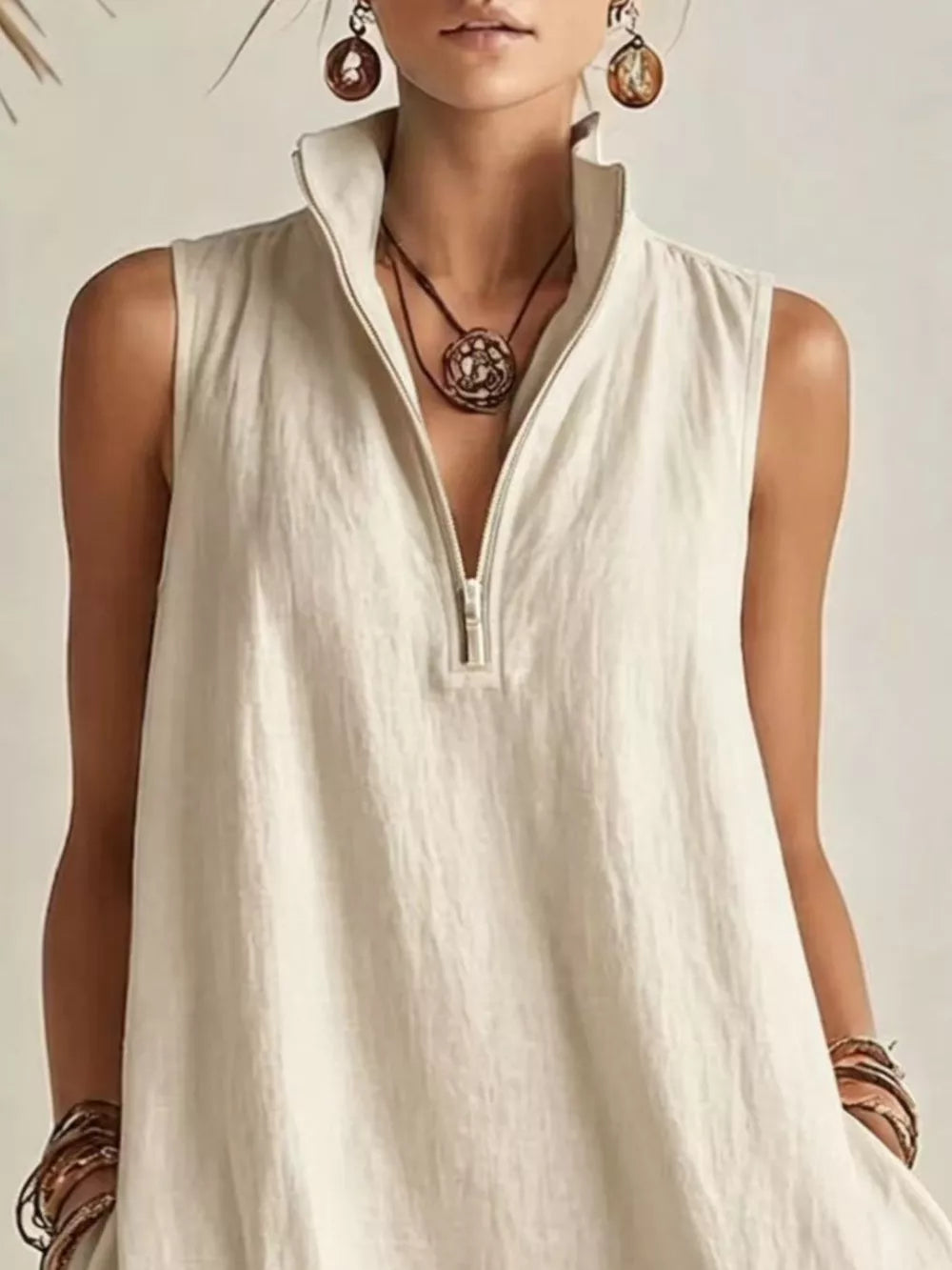 100% polyester Care instructions: Machine wash cold mini dress in Beige with A-line silhouette