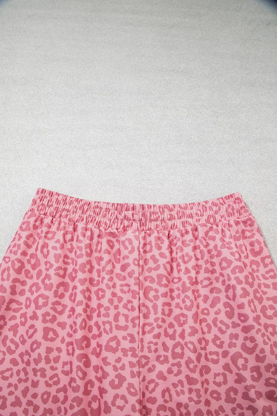 pink two-piece set with side stripes and elbow sleeve