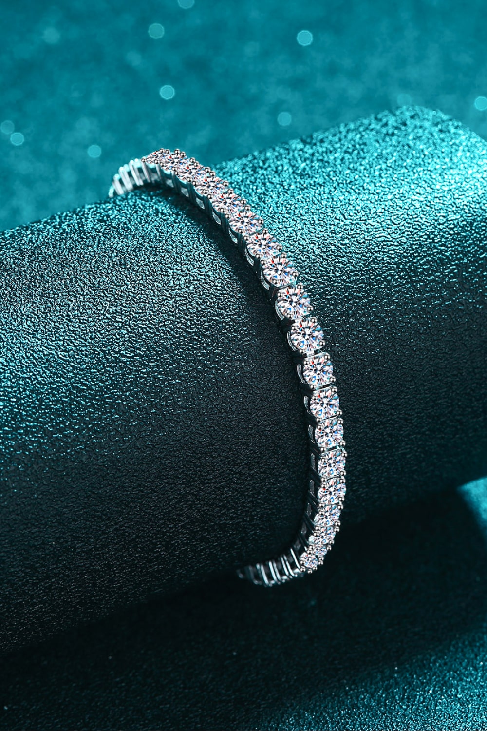 Silver diamond tennis bracelet with clear round-cut stones