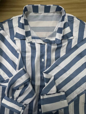 button-up shirt featuring striped in ivory with 100% polyester Care instructions: Machine wash cold texture