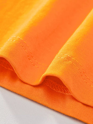 Kids' tangerine orange cotton t-shirt with visible stitching detail